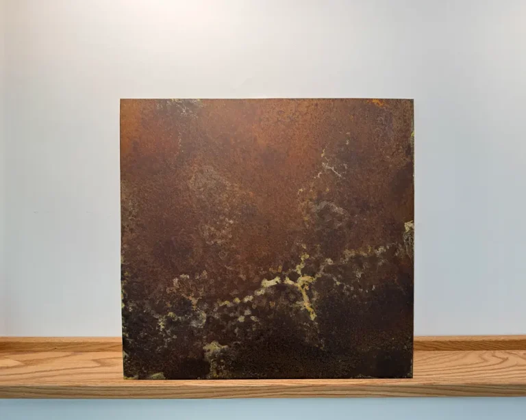 Custom distressed stainless steel panels with a rusted texture.